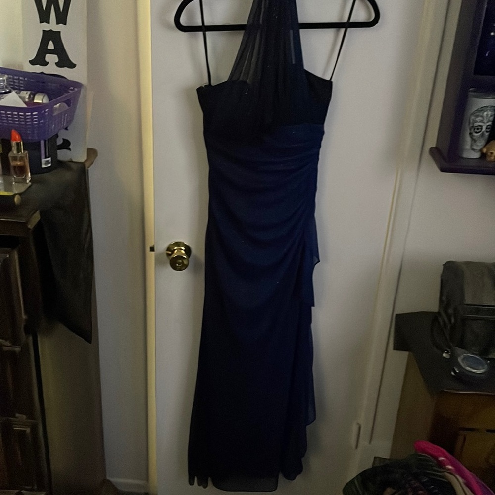 Beautiful king sparkly navy blue dress. Never used .